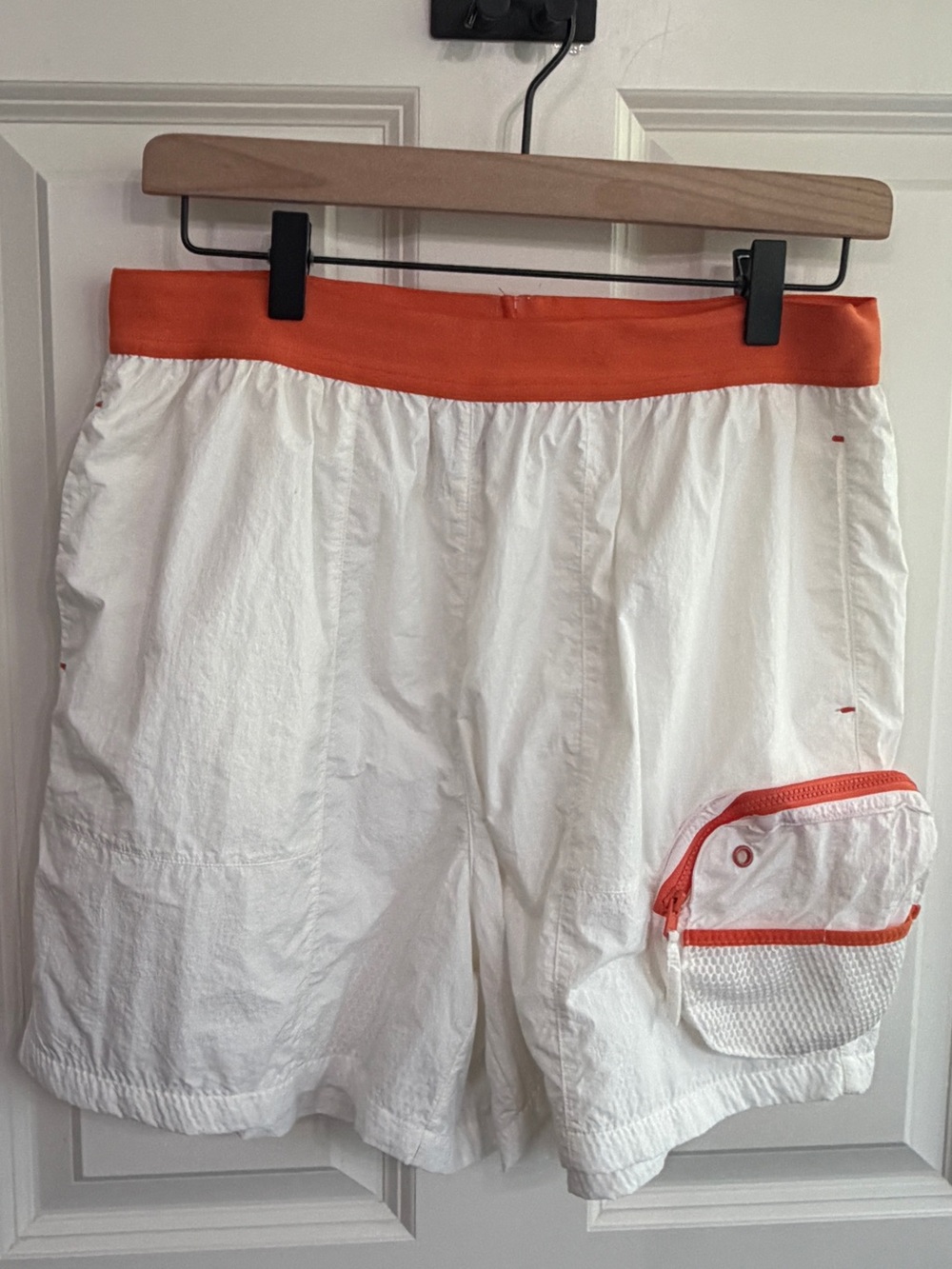 Great condition size M White Shorts with Orange details and great pockets! Beach